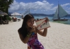 let my friend print and hold a sign with your logo or text on Boracay White Beach the most beautiful beach in the world