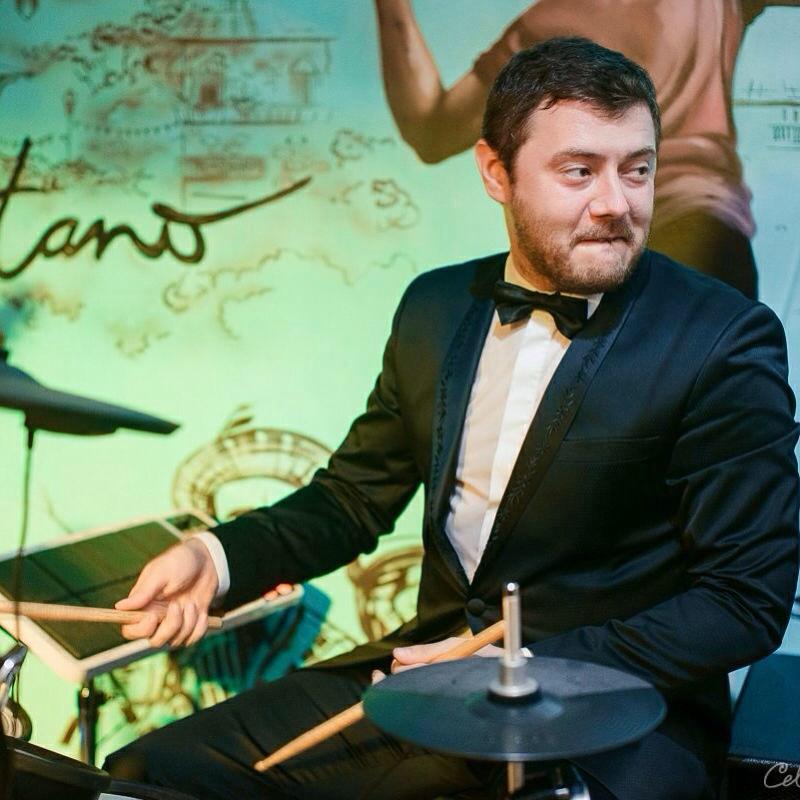 I will record a drum track for your song