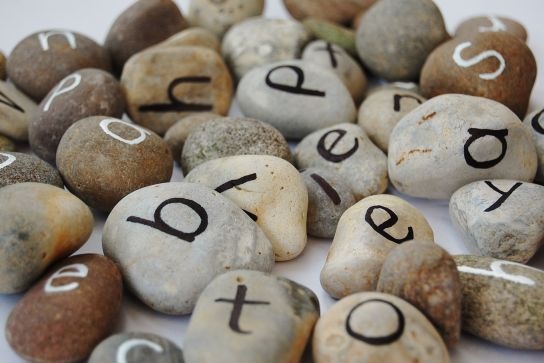 create a unique message from natural coloured stones and send you the images to use as a gift or for promotional purposes