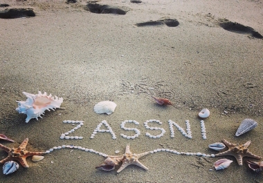 Your amazing text with shells on the beach